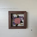 Load image into Gallery viewer, Small framed artwork with pressed flowers on a white wall