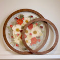 Load image into Gallery viewer, Two circular wooden frames with pressed flowers on a white surface
