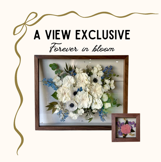 Framed bouquet with 'A View Exclusive Forever in Bloom' text on a white background